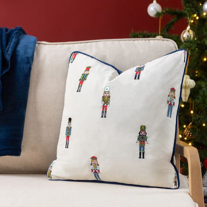 Experience the enchanting origins of the Nutcracker, a cherished German tradition that brings luck to every festive Christmas season. Beautifully embroidered and backed in a soft velvet this feather filled cushion is perfect for the festive season.