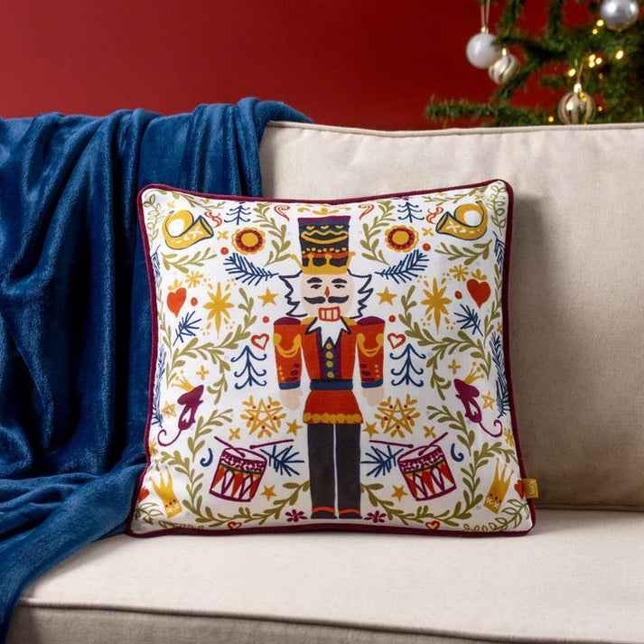 Experience the enchanting origins of the Nutcracker, a cherished German tradition that brings luck to every festive Christmas season. Beautiful printed festive design, highlighting a striking Nutcracker and backed in a soft velvet this feather filled cushion is perfect for the festive season.