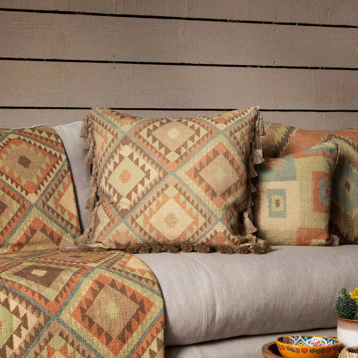 The Serrano patterned cushions deliver a unique, luxurious look to any living space. The vibrant Aztec-style fringed design is crafted with high-quality, feather filling for a soft, sumptuous feel.