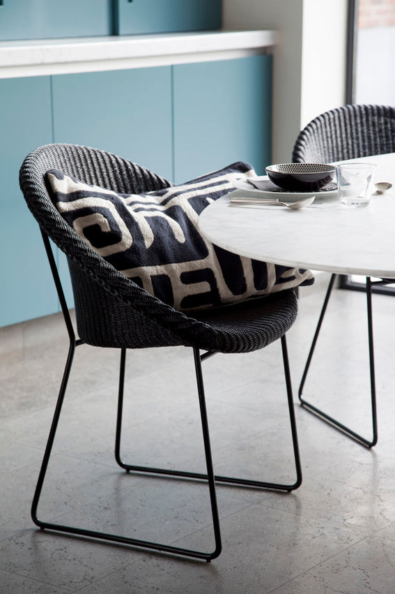 The Joe dining chair is a modern, light and refined design. The delicately woven seat adds a warm touch to any interior while the steel base gives the stool a more contemporary look.