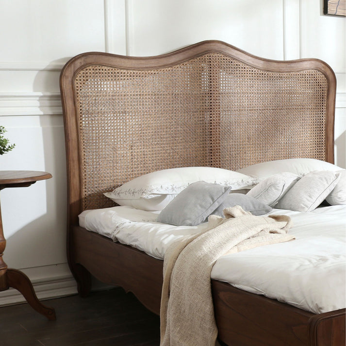 The Elsa bed frame, beautifully complimenting the rest of this graceful range. This stately bed features shaped legs, profiled side rails and an elegantly framed rattan head board. In addition it uses solid slats for a supportive and ventilated mattress base.