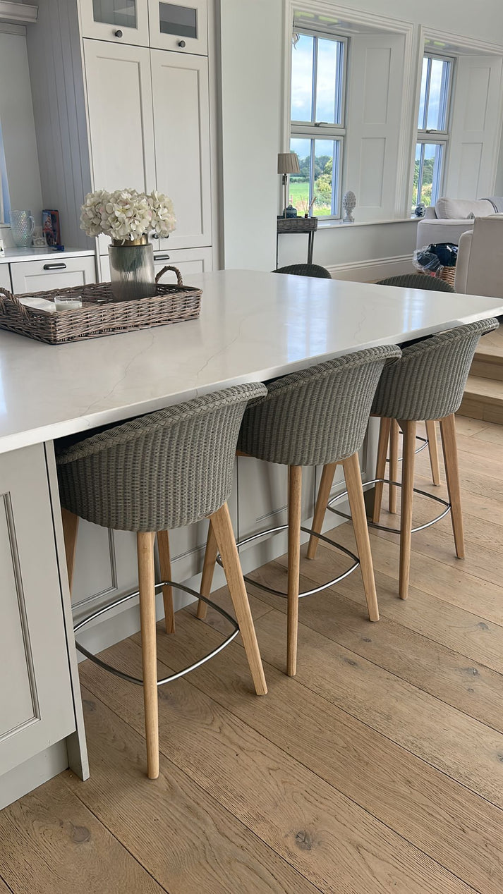 The Avril Counter Stool is a lovely counter stool in delicate Lloyd Loom weave with a beautifully crafted oak wood base.