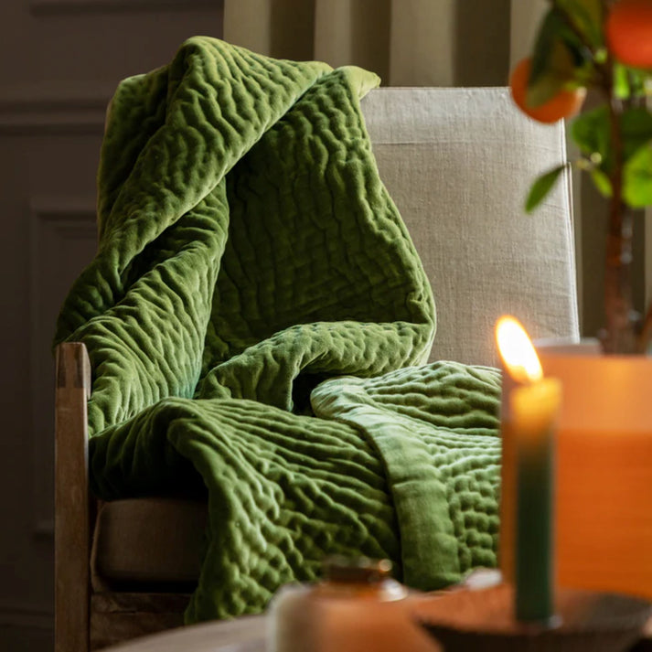 A soft luxurious velvet throw in a nature inspired grass green tone. Designed to offer warmth and comfort with a pop of colour adding a touch of style to your room. Perfect for cosy nights at home or simply to relax and unwind.